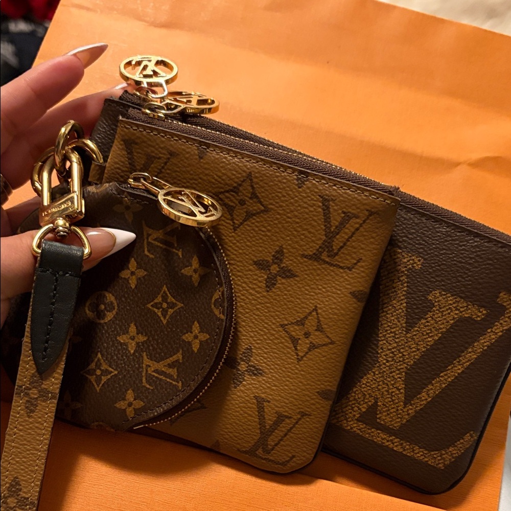 Louis vuitton trio clutch